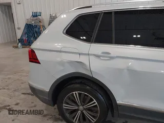 2019 Volkswagen Tiguan SE with VIN 3VV3B7AX9KM030028, listed as a IAAI auction lot 40445099 with 85,400 mi miles and . Bid and sale history available at DreamBid. Image 18.