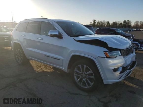 2017 Jeep Grand Cherokee Overland with VIN 1C4RJFCG8HC906200, listed as a Copart auction lot 49837375 with 108,852 mi miles and Salvage Title. Bid and sale history available at carsss.com. Image 4.