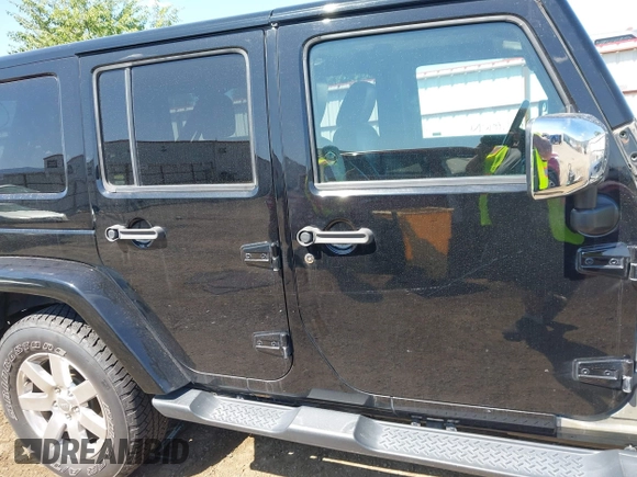 2016 Jeep Wrangler Unlimited Sahara with VIN 1C4BJWEG7GL250357, listed as a IAAI auction lot 42665881 with 102,168 mi miles and . Bid and sale history available at DreamBid. Image 14.