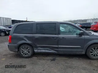 2015 Chrysler Town & Country S with VIN 2C4RC1HG7FR522449, listed as a IAAI auction lot 42021311 with 107,391 mi miles. Bid and sale history available at carsss.com. Image 6.