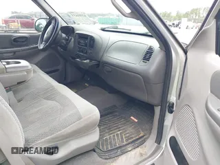 1999 Ford F-150 with VIN 1FTRX17W5XNC01330, listed as a IAAI auction lot 42101633 with 262,374 mi miles and . Bid and sale history available at DreamBid. Image 5.