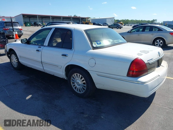 2006 Mercury Grand Marquis LS Premium z VIN 2MEFM75V46X614439, wystawiony jako IAAI lot #42319947 z przebiegiem 125 715 mil mil oraz . Historia ofert i sprzedaży dostępna na DreamBid. Obrazek 3.