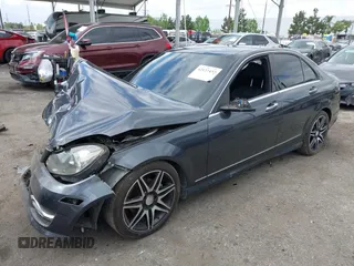 2014 Mercedes-Benz C C 250 Sport with VIN WDDGF4HB6ER317333, listed as a IAAI auction lot 42127437 with 128,010 mi miles. Bid and sale history available at carsss.com. Image 18.