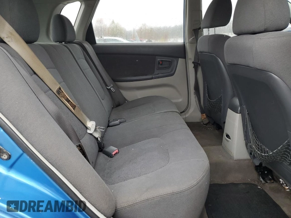 2005 Kia Spectra with VIN KNAFE161955108612, listed as a Copart auction lot 79648514 with 156,963 mi miles and Salvage Title. Bid and sale history available at carsss.com. Image 11.