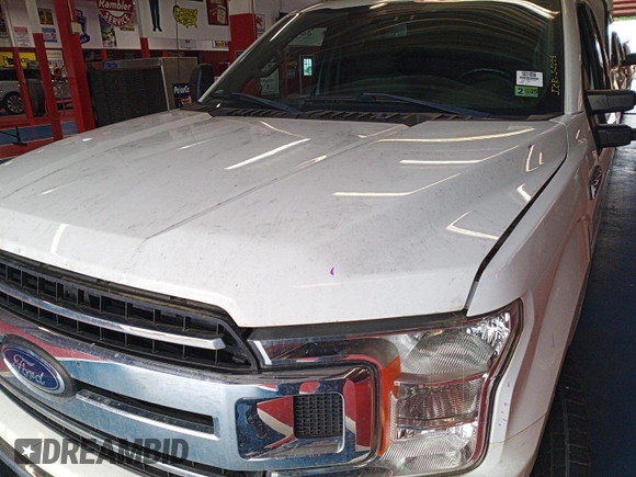 2019 Ford F-150 XL z VIN 1FTEX1C48KKE41467, wystawiony jako IAAI lot #42518514 z przebiegiem 107 651 mil mil oraz . Historia ofert i sprzedaży dostępna na DreamBid. Obrazek 8.