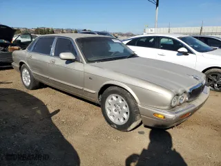 1998 Jaguar XJ with VIN SAJHX1248WC818587, listed as a Copart auction lot 74418114 with 112,395 mi miles and Clean Title. Bid and sale history available at carsss.com. Image 4.