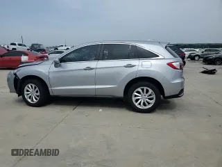2018 Acura RDX with VIN 5J8TB3H34JL011396, listed as a Copart auction lot 56889575 with 69,300 mi miles and Salvage title. Bid and sale history available at DreamBid. Image 14.