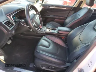 2019 Ford Fusion Hybrid Titanium with VIN 3FA6P0RU0KR181864, listed as a Copart auction lot 68120242 with 102,249 mi miles. Bid and sale history available at carsss.com. Image 7.