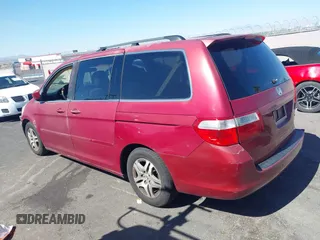 2005 Honda Odyssey EX z VIN 5FNRL38445B401163, wystawiony jako IAAI lot #42294253 z przebiegiem 152 576 mil mil oraz . Historia ofert i sprzedaży dostępna na DreamBid. Obrazek 3.