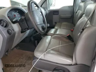 2007 Ford F-150 XL with VIN 1FTRF12297NA82401, listed as a Copart auction lot 58295705 with 198,470 mi miles and Salvage title. Bid and sale history available at DreamBid. Image 7.