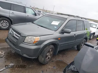 2007 Honda Pilot EX-L with VIN 5FNYF18697B002843, listed as a IAAI auction lot 41549328 with 202,365 mi miles and . Bid and sale history available at DreamBid. Image 17.