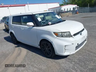 2013 Scion xB with VIN JTLZE4FE0DJ045236, listed as a IAAI auction lot 42132654 with 1 mi miles. Bid and sale history available at carsss.com. Image 1.