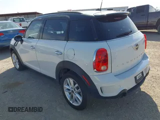 2014 MINI Countryman S z VIN WMWZC3C57EWP51864, wystawiony jako IAAI lot #42556774 z przebiegiem 73 912 mil mil oraz . Historia ofert i sprzedaży dostępna na DreamBid. Obrazek 3.