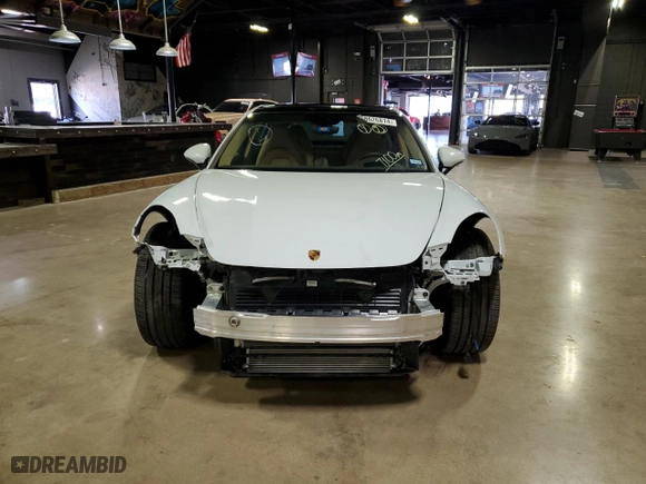 2022 Porsche Panamera with VIN WP0AJ2A75NL102179, listed as a Copart auction lot 58626814 with 7,100 mi miles and Salvage Title. Bid and sale history available at carsss.com. Image 2.