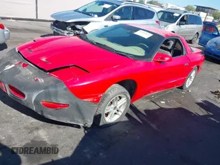 1997 Pontiac Firebird Trans Am z VIN 2G2FV22P8V2208008, wystawiony jako IAAI lot #42193832 z przebiegiem Nie podano mil oraz . Historia ofert i sprzedaży dostępna na DreamBid. Obrazek 2.
