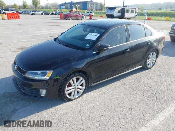 2013 Volkswagen Jetta GLI with VIN 3VW4S7AJ2DM300120, listed as a IAAI auction lot 42002950 with 106,304 mi miles and . Bid and sale history available at DreamBid. Image 2.