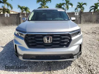 2024 Honda Pilot EX-L 7 Passenger with VIN 5FNYG2H50RB007894, listed as a Copart auction lot 59764574 with 3,801 mi miles and Non Repairable. Bid and sale history available at carsss.com. Image 5.
