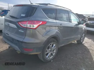 2013 Ford Escape SEL with VIN 1FMCU0HX1DUD51965, listed as a IAAI auction lot 41667262 with 164,493 mi miles and . Bid and sale history available at DreamBid. Image 4.