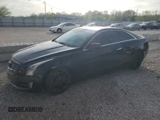 2015 Cadillac ATS z VIN 1G6AE1R3XF0108100, wystawiony jako Copart lot #54190865 z przebiegiem 162 650 mil mil oraz Szkoda całkowita • Salvage title. Historia ofert i sprzedaży dostępna na DreamBid. Obrazek 1.