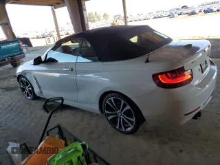 2016 BMW 2 Series 228i with VIN WBA1K9C53GV710823, listed as a Copart auction lot 84087434 with 70,822 mi miles and Salvage Title. Bid and sale history available at carsss.com. Image 2.