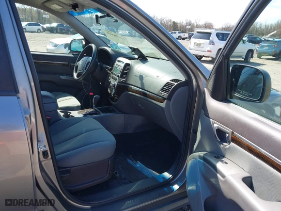 2012 Hyundai Santa Fe GLS with VIN 5XYZG3AB3CG101245, listed as a IAAI auction lot 41938369 with 191,385 mi miles. Bid and sale history available at carsss.com. Image 5.