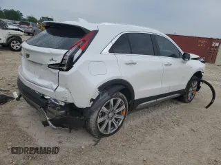 2023 Cadillac XT4 FWD Premium Luxury with VIN 1GYFZCR42PF193101, listed as a Copart auction lot 54977605 with 14,258 mi miles and Non repairable. Bid and sale history available at DreamBid. Image 3.