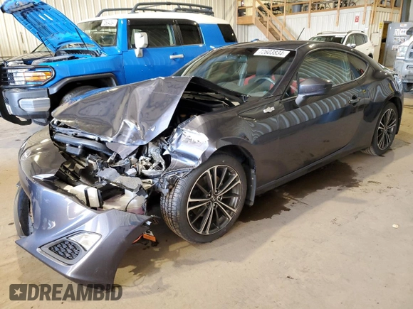 2014 Scion FR-S z VIN JF1ZNAA11E9701435, wystawiony jako Copart lot #72603834 z przebiegiem 127 940 mil mil oraz Szkoda całkowita • Salvage title. Historia ofert i sprzedaży dostępna na DreamBid. Obrazek 1.