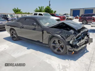 2014 Dodge Challenger R/T Plus z VIN 2C3CDYBT0EH122467, wystawiony jako Copart lot #58392365 z przebiegiem 136 793 mil mil oraz Szkoda całkowita • Salvage title. Historia ofert i sprzedaży dostępna na DreamBid. Obrazek 4.