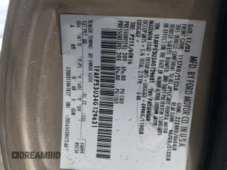 2004 Ford Taurus SE with VIN 1FAFP53U34G129631, listed as a Copart auction lot 45054375 with 182,089 mi miles and Salvage title. Bid and sale history available at DreamBid. Image 12.
