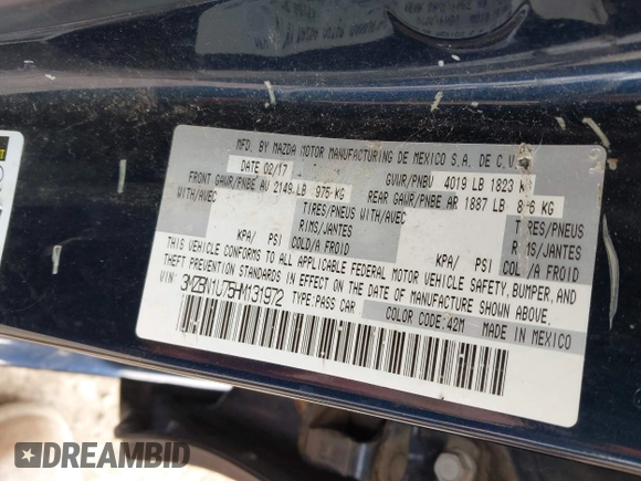 2017 Mazda 3 Sport with VIN 3MZBN1U75HM131972, listed as a IAAI auction lot 42085171 with 110,053 mi miles and . Bid and sale history available at DreamBid. Image 9.