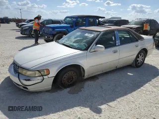 2003 Cadillac Seville Luxury SLS z VIN 1G6KS54Y03U289834, wystawiony jako Copart lot #77362694 z przebiegiem Nie podano mil oraz Szkoda całkowita • Salvage title. Historia ofert i sprzedaży dostępna na DreamBid. Obrazek 1.