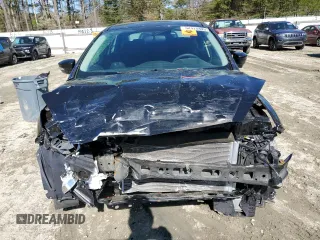 2015 Ford Focus SE with VIN 1FADP3F26FL228606, listed as a Copart auction lot 52525445 with 37,477 mi miles and Salvage Title. Bid and sale history available at DreamBid. Image 5.