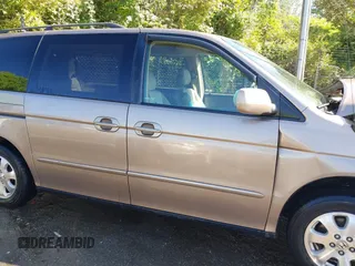 2003 Honda Odyssey EX-L z VIN 5FNRL180X3B055800, wystawiony jako IAAI lot #42053575 z przebiegiem 203 398 mil mil oraz . Historia ofert i sprzedaży dostępna na DreamBid. Obrazek 13.