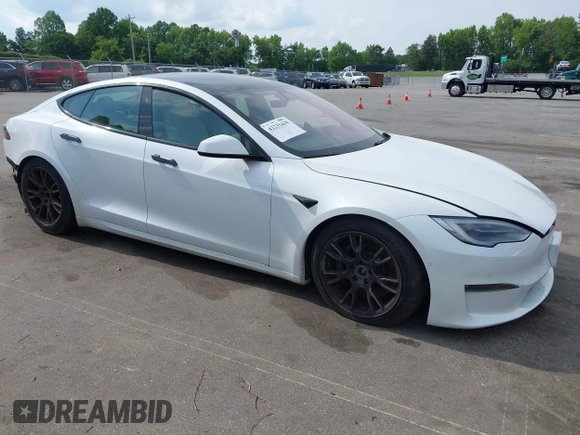 2022 Tesla Model S with VIN 5YJSA1E57NF462175, listed as a IAAI auction lot 42231439 with Not provided miles and . Bid and sale history available at DreamBid. Image 1.