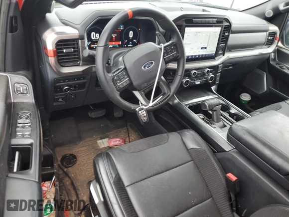 2023 Ford F-150 Raptor with VIN 1FTFW1RG4PFB17389, listed as a Copart auction lot 51703635 with 19,772 mi miles and Salvage Title. Bid and sale history available at DreamBid. Image 8.