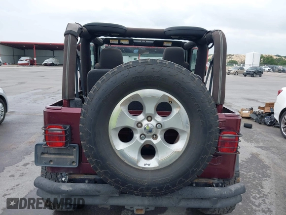 2003 Jeep Wrangler Sport with VIN 1J4FA49S63P324904, listed as a IAAI auction lot 42138001 with 170,917 mi miles and . Bid and sale history available at DreamBid. Image 16.