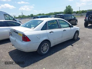 2007 Ford Focus S with VIN 1FAFP34N47W183106, listed as a IAAI auction lot 42540411 with 281,111 mi miles and . Bid and sale history available at DreamBid. Image 4.