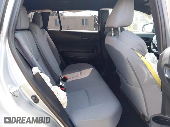 2023 Toyota Corolla Cross Hybrid S with VIN 7MUFBABG1PV014992, listed as a IAAI auction lot 42202656 with 18,913 mi miles and . Bid and sale history available at DreamBid. Image 8.