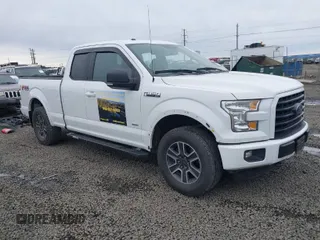 2015 Ford F-150 XLT with VIN 1FTEX1EP1FFA21653, listed as a IAAI auction lot 41597518 with 153,111 mi miles. Bid and sale history available at carsss.com. Image 1.