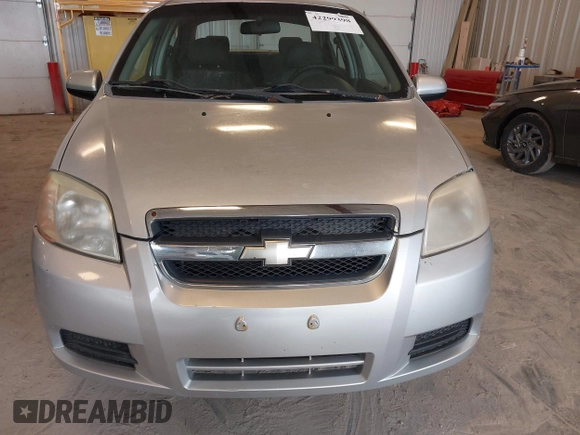 2008 Chevrolet Aveo LS with VIN KL1TD56618B064257, listed as a IAAI auction lot 42299398 with 158,877 mi miles and . Bid and sale history available at DreamBid. Image 12.