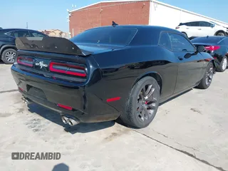 2021 Dodge Challenger R/T Scat Pack z VIN 2C3CDZFJXMH509833, wystawiony jako IAAI lot #41516858 z przebiegiem 66 880 mil mil oraz . Historia ofert i sprzedaży dostępna na DreamBid. Obrazek 4.