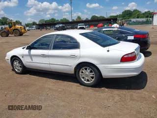 2005 Mercury Sable LS z VIN 1MEFM55S25A621939, wystawiony jako IAAI lot #42607222 z przebiegiem 237 492 mil mil oraz . Historia ofert i sprzedaży dostępna na DreamBid. Obrazek 14.
