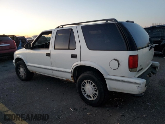 1998 GMC Jimmy SLS with VIN 1GKDT13W9W2506846, listed as a Copart auction lot 84854964 with 151,051 mi miles and Salvage Title. Bid and sale history available at carsss.com. Image 2.