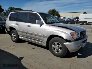 2002 Toyota Land Cruiser with VIN JTEHT05J922020391, listed as a Copart auction lot 52810615 with 309,358 mi miles and Salvage Title. Bid and sale history available at carsss.com. Image 4.