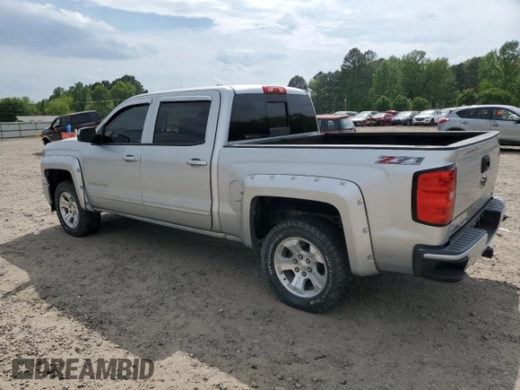 2015 Chevrolet Silverado 1500 LT with VIN 3GCUKREC9FG147988, listed as a Copart auction lot 53784635 with 218,260 mi miles and Salvage Title. Bid and sale history available at DreamBid. Image 2.