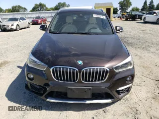 2017 BMW X1 xDrive28i z VIN WBXHT3C32H5F73536, wystawiony jako Copart lot #58431875 z przebiegiem 108 549 mil mil oraz Szkoda całkowita • Salvage title. Historia ofert i sprzedaży dostępna na DreamBid. Obrazek 5.