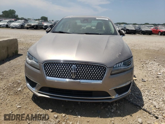 2020 Lincoln MKZ Hybrid Reserve z VIN 3LN6L5LUXLR606340, wystawiony jako Copart lot #65235544 z przebiegiem Nie podano mil oraz Szkoda całkowita • Salvage title. Historia ofert i sprzedaży dostępna na DreamBid. Obrazek 5.