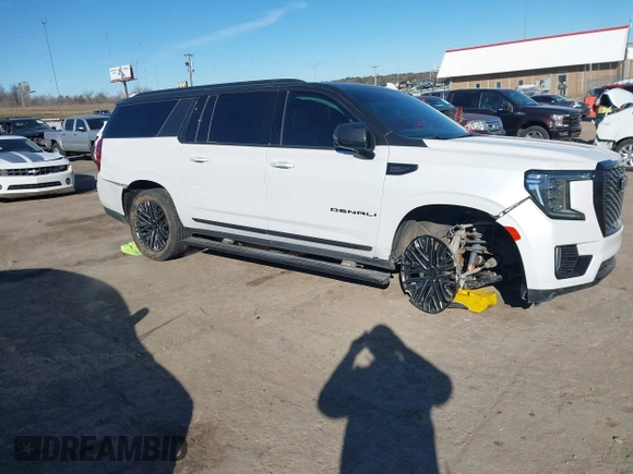 2021 GMC Yukon XL Denali with VIN 1GKS2JKT1MR401207, listed as a IAAI auction lot 41242619 with 87,902 mi miles and . Bid and sale history available at carsss.com. Image 6.