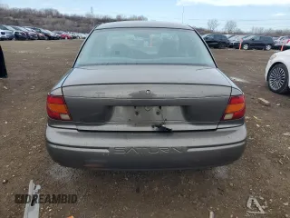 2000 Saturn SL with VIN 1G8ZH528XYZ217346, listed as a Copart auction lot 51164695 with 94,076 mi miles and Salvage title. Bid and sale history available at DreamBid. Image 6.