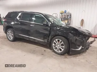 2018 Chevrolet Traverse Premier z VIN 1GNEVJKW6JJ179467, wystawiony jako IAAI lot #41214356 z przebiegiem 93 931 mil mil oraz . Historia ofert i sprzedaży dostępna na DreamBid. Obrazek 1.